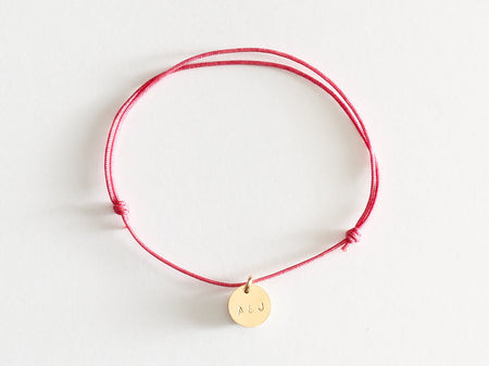 Bracelet "Mini médaille" à personnaliser en or laminé sur cordon rose pivoine